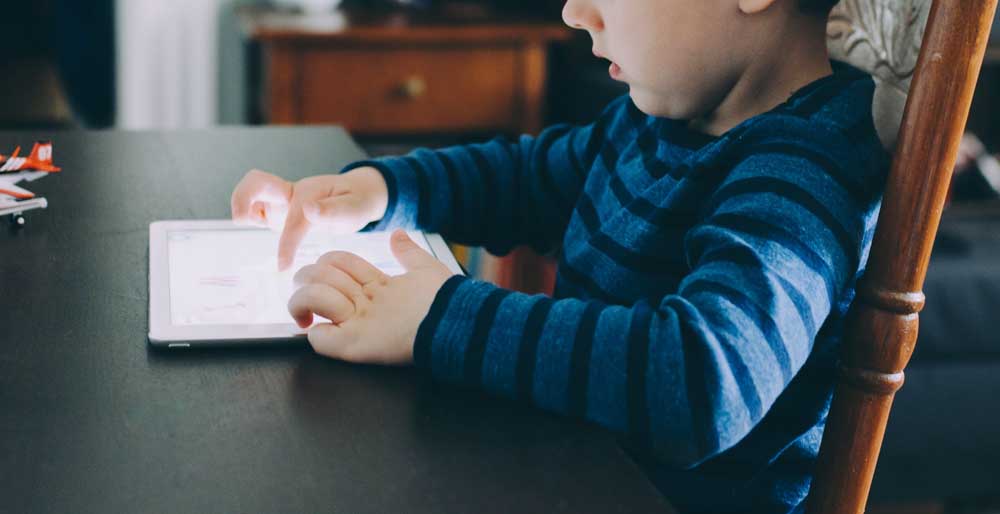 Junior screen time: Photo by Kelly Sikkema on Unsplash